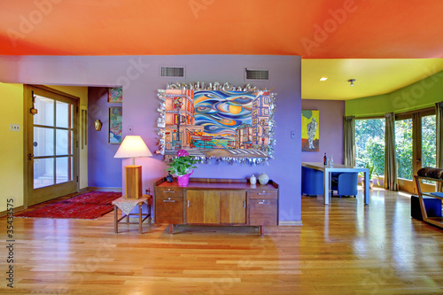 Retro bright living room with purple wall