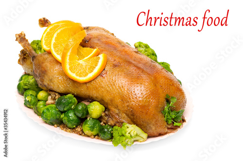 Christmas roast goose with Brussels sprouts and broccoli isolate