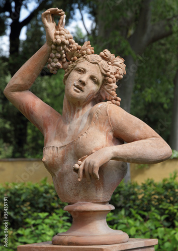 ancient bust of woman in terracotta in italian garden