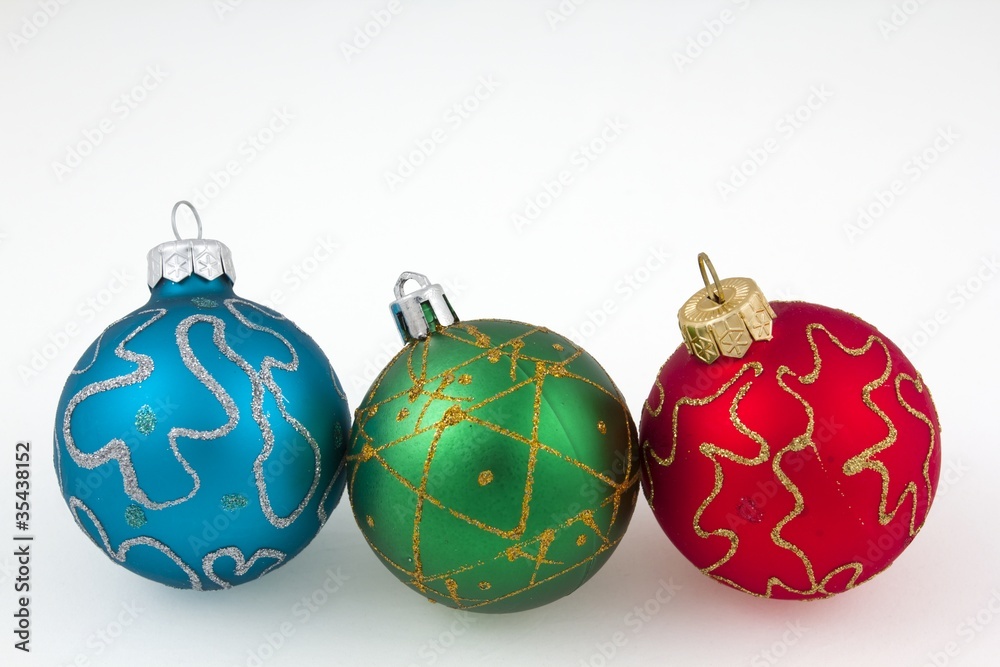 three christmas balls on a white background three christmas balls on a white background
