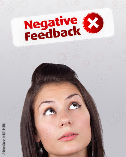 Young girl looking at positive negative signs