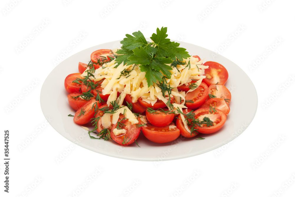 Red tomatoes from above are strewed by cheese Red tomatoes from above are strewed by cheese
