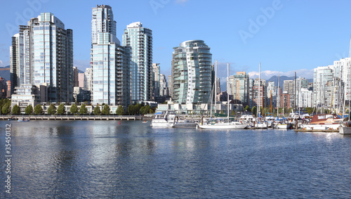 Vancouver BC south waterfront skyline & sailboats.
