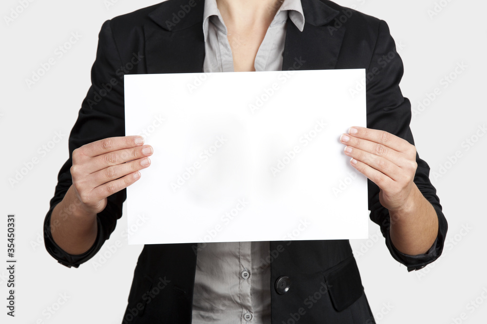 Holding a paper card Holding a paper card
