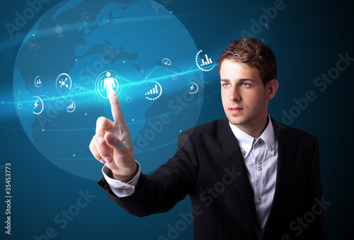 Businessman pressing modern social type of icons