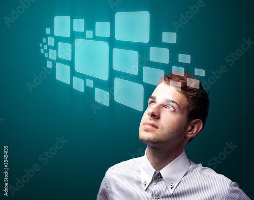 Businessman pressing high tech type of modern buttons