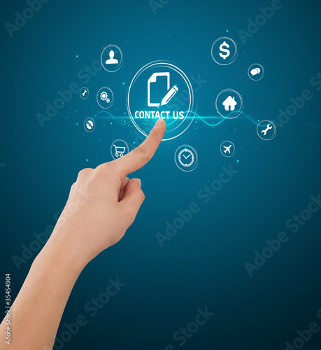 Businessman pressing virtual messaging type of icons