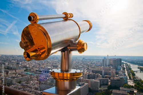 Eiffel Tower telescope overlooking for Paris.