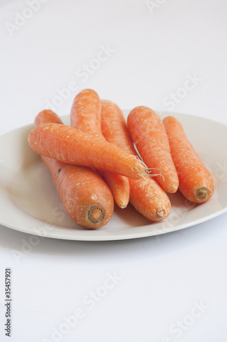 Roughly carrots in the white dish