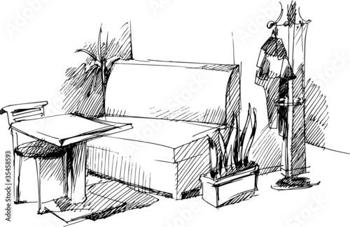 table and chair near a sofa
