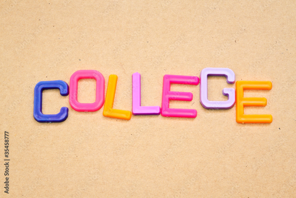 College in colorful toy letters on paper background College in colorful toy letters on paper background