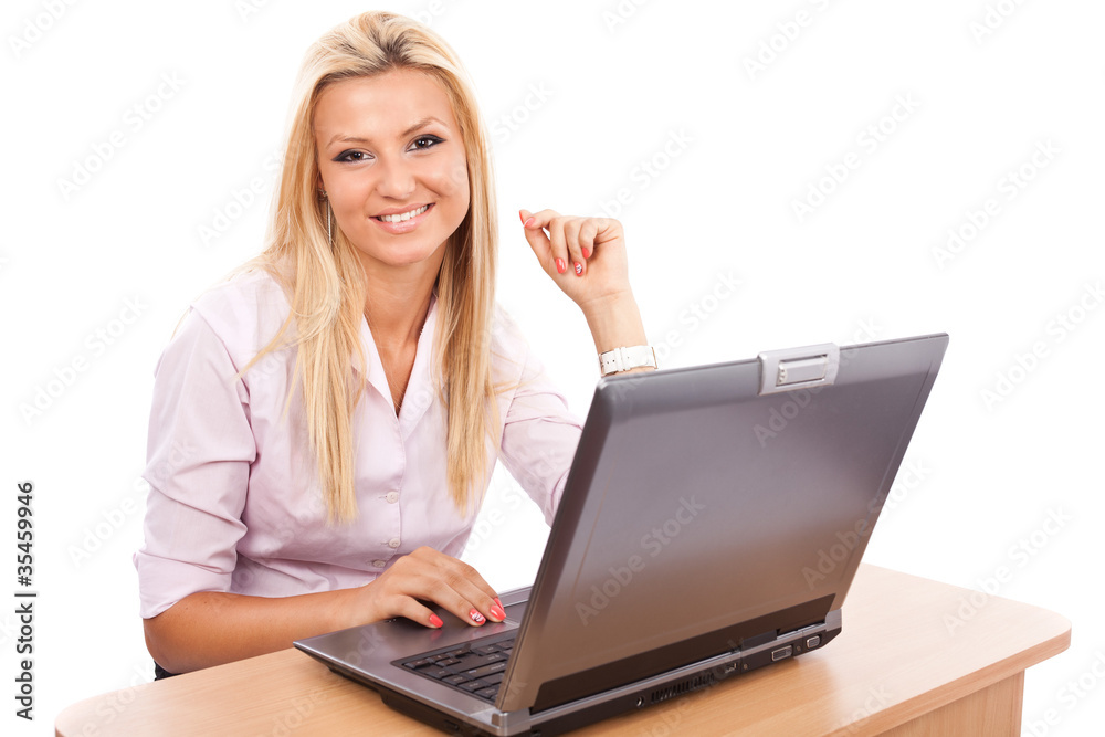 Happy businesswoman at her computer Happy businesswoman at her computer