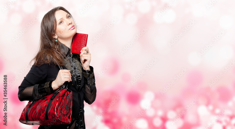 Φωτογραφία Portrait of a bright beautiful young woman with fashion  handbag