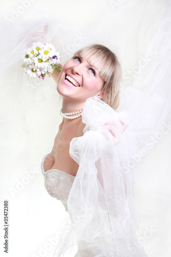 beautiful bride in white veil