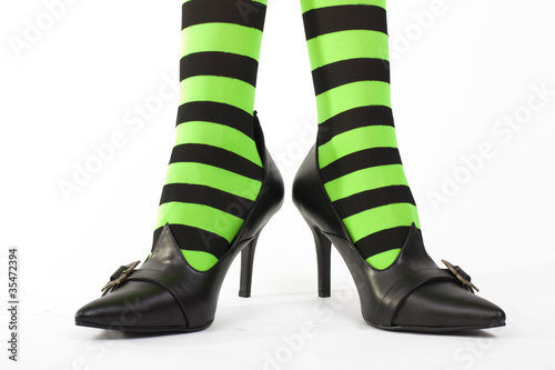 Witch's striped legged stockings, white background.