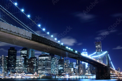 Fototapeta Naklejka Na Ścianę i Meble -  Brooklyn Bridge and Manhattan Skyline At Night, New York City