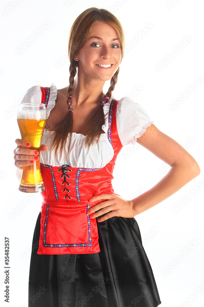 The girl in a traditional Bavarian dress The girl in a traditional Bavarian dress