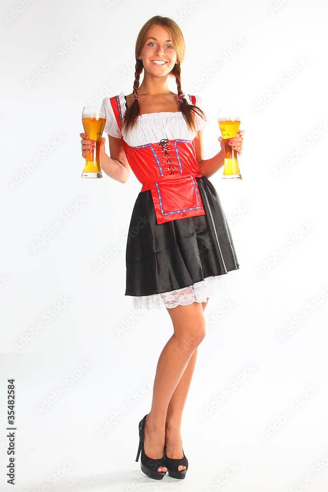 The girl in a traditional Bavarian dress The girl in a traditional Bavarian dress
