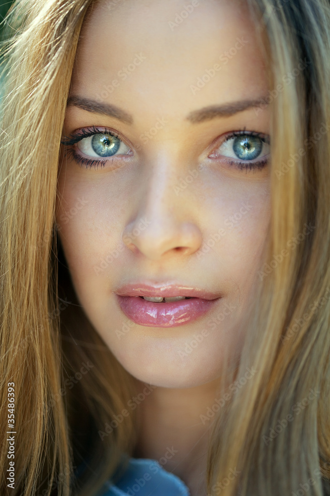 Beautiful girl with blue eyes