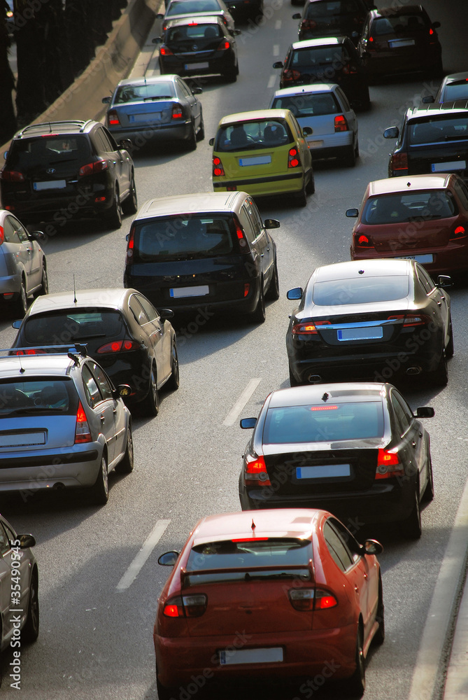 automobile traffic on road to barcelona, spain