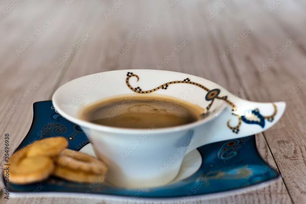 Coffee cup on white wood table Coffee cup on white wood table