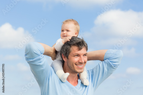 successful dad with baby