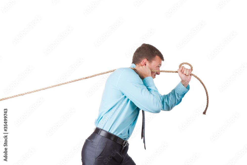 Businessman pulling a rope isolated on white