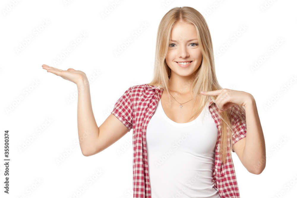 Female showing and pointing to blank copy space Female showing and pointing to blank copy space