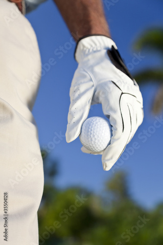 Golfer Holding Golf Ball