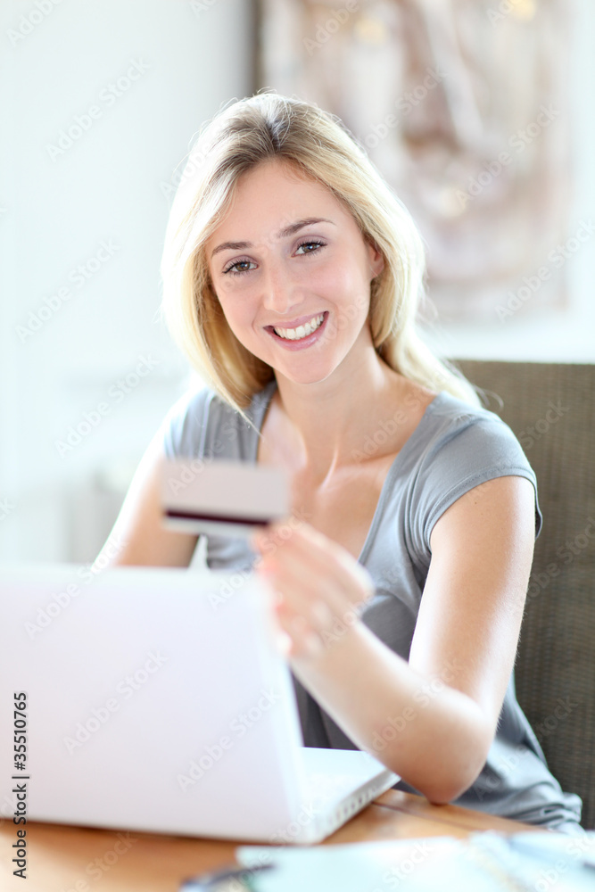 Young woman doing online shopping Young woman doing online shopping
