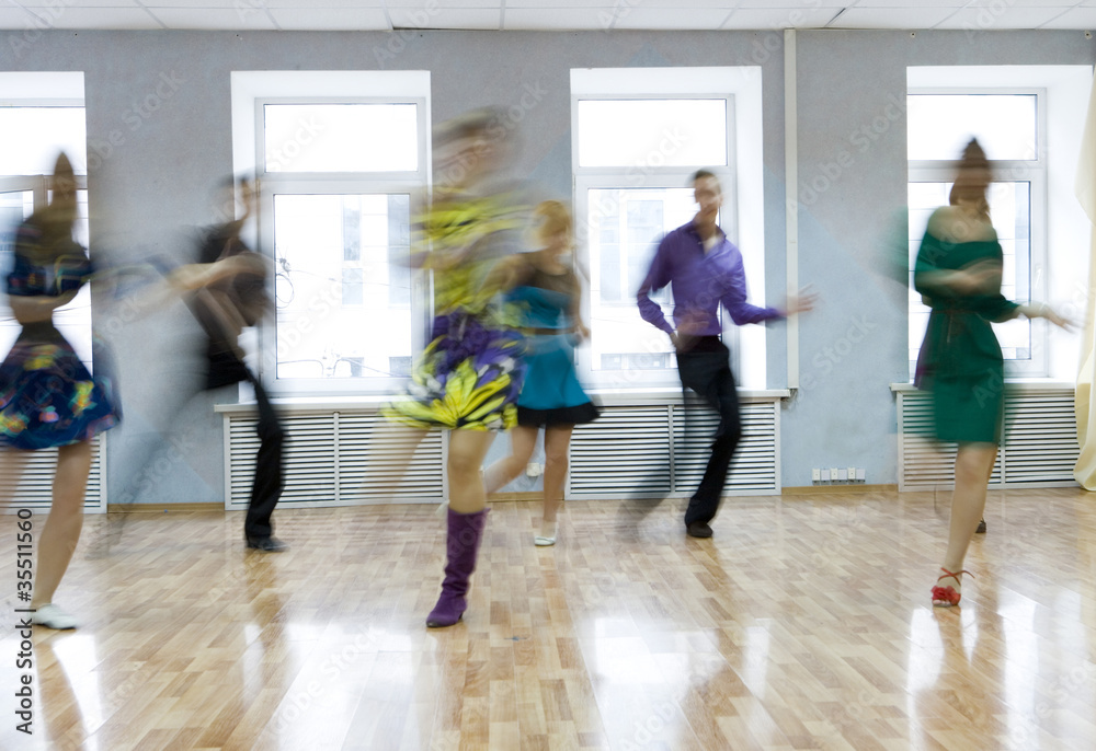 Group of Young People Training at a Dance Class Group of Young People Training at a Dance Class
