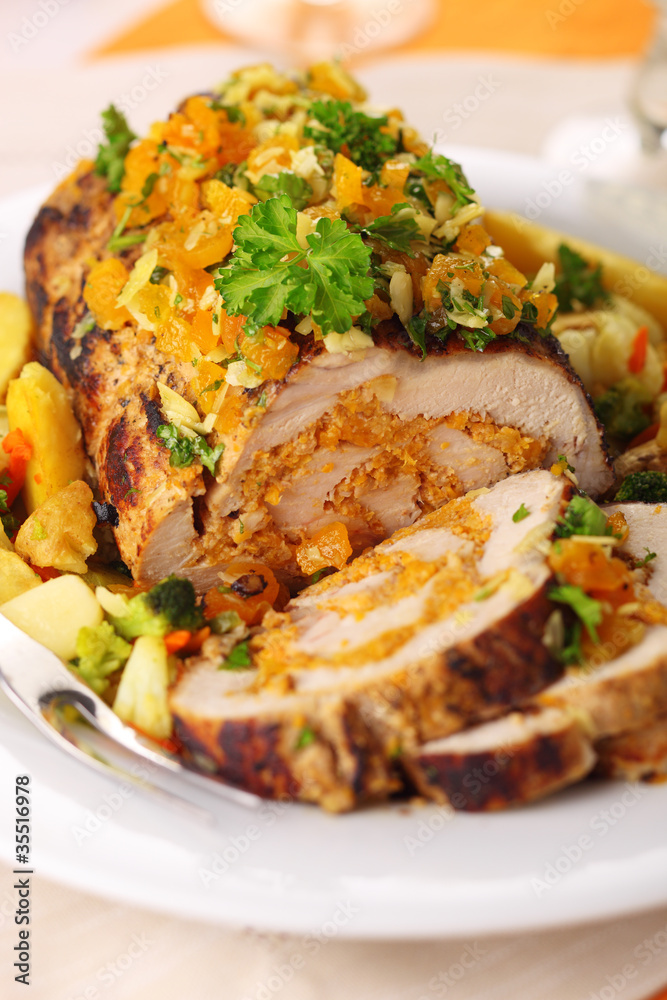 Stuffed pork roast with dried apricots and nuts