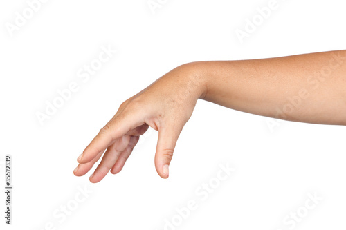 Woman's hand dropping something
