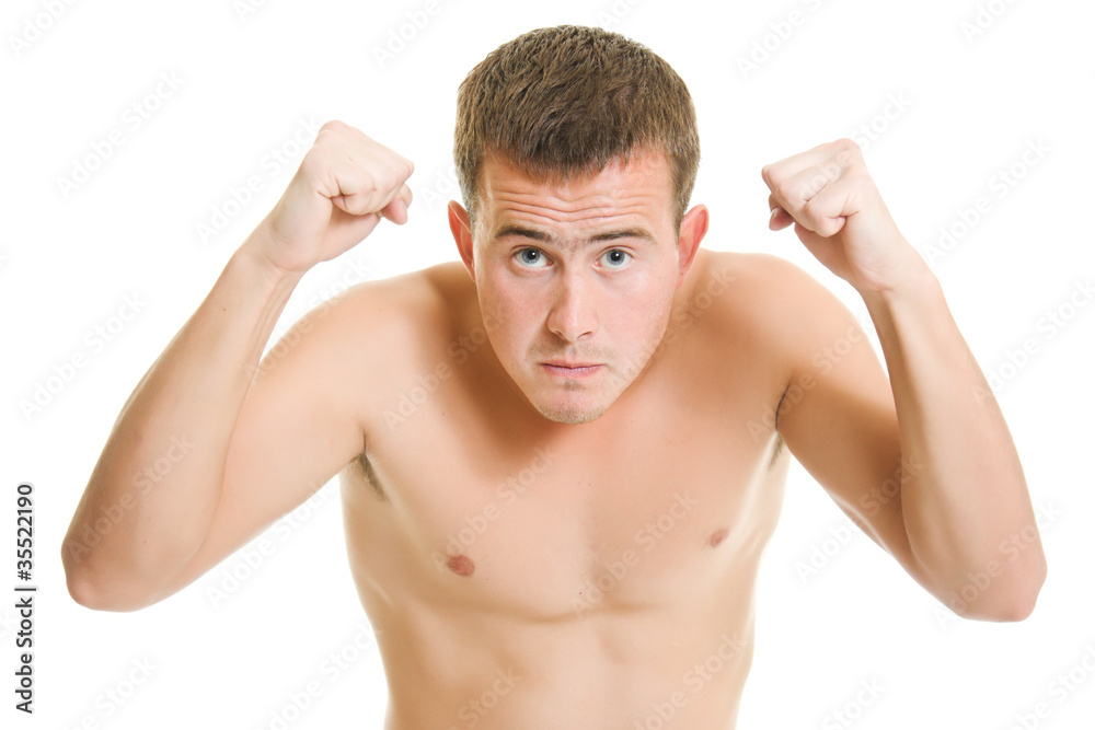 Fototapeta premium A man compresses his fists