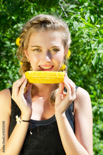 woman eating corn-cob