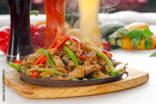Billede på lærred original fajita sizzling hot  on iron plate