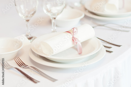 Details of a wedding table set for fine dining