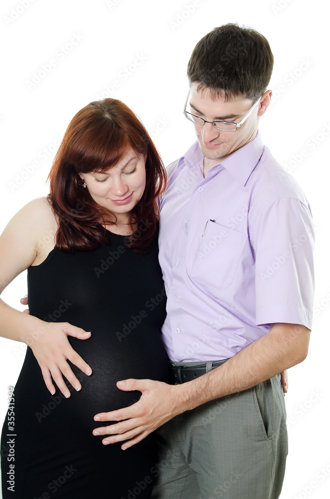 happy pregnant couple isolated on white happy pregnant couple isolated on white