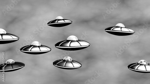 UFO flying in the sky. Loop, alpha.