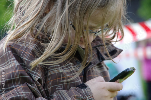 Little girl making a call