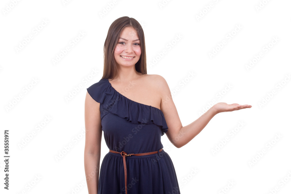 Beautiful teenage girl smiling and showing isolated Beautiful teenage girl smiling and showing isolated