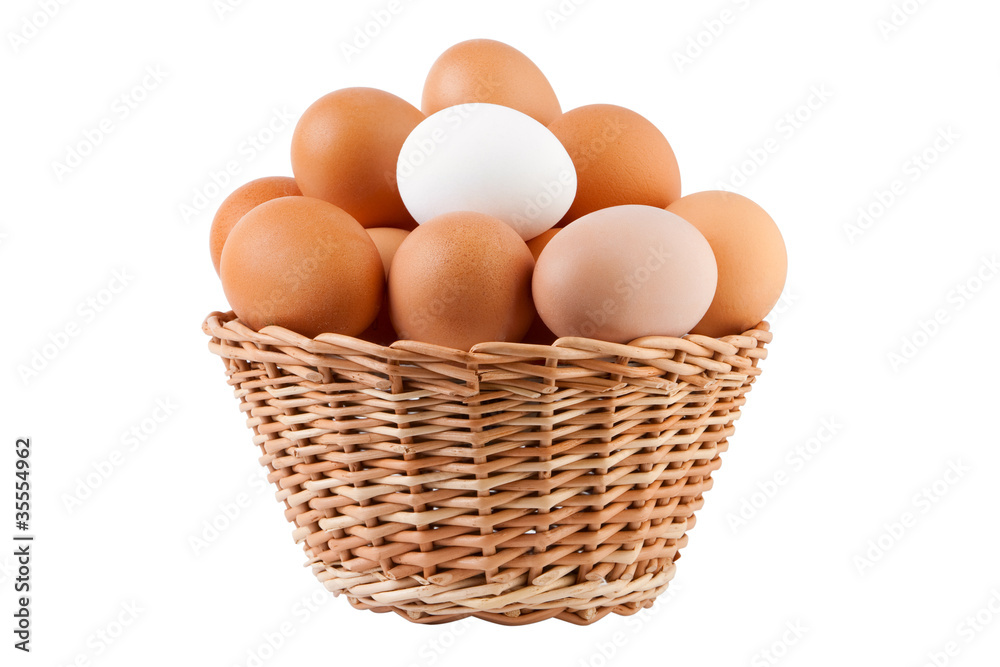 basket filled with eggs,isolated on white basket filled with eggs,isolated on white