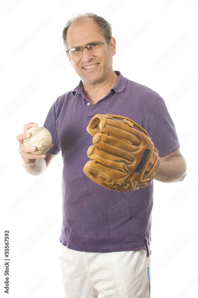 middle age senior man softball throwing into baseball glove on middle age senior man softball throwing into baseball glove on