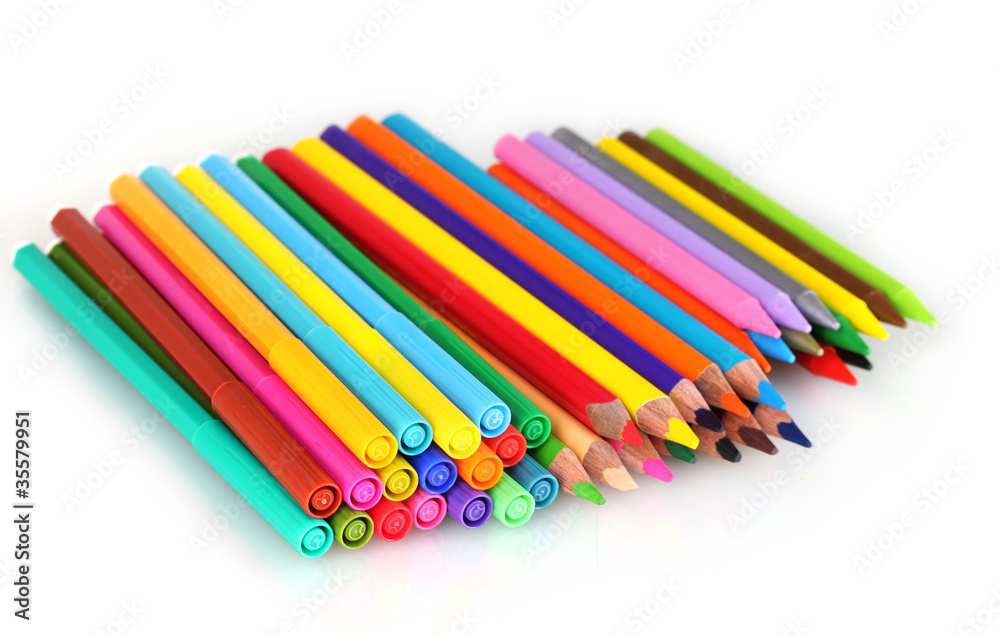 Bright markers and crayons isolated on white Bright markers and crayons isolated on white