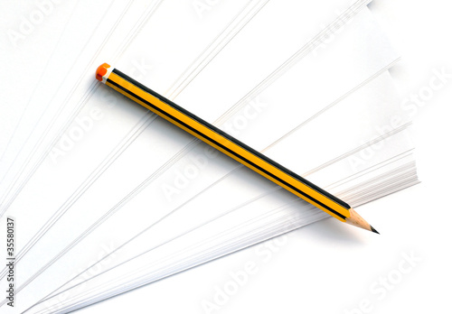 pencil lying on clean white paper