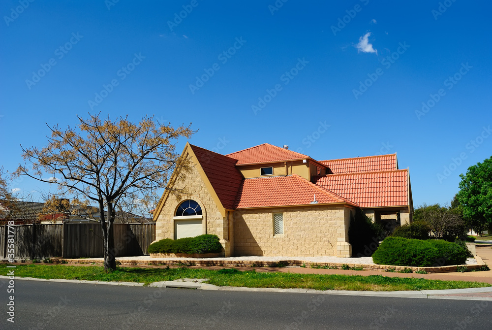 Beautiful family house over blue sky