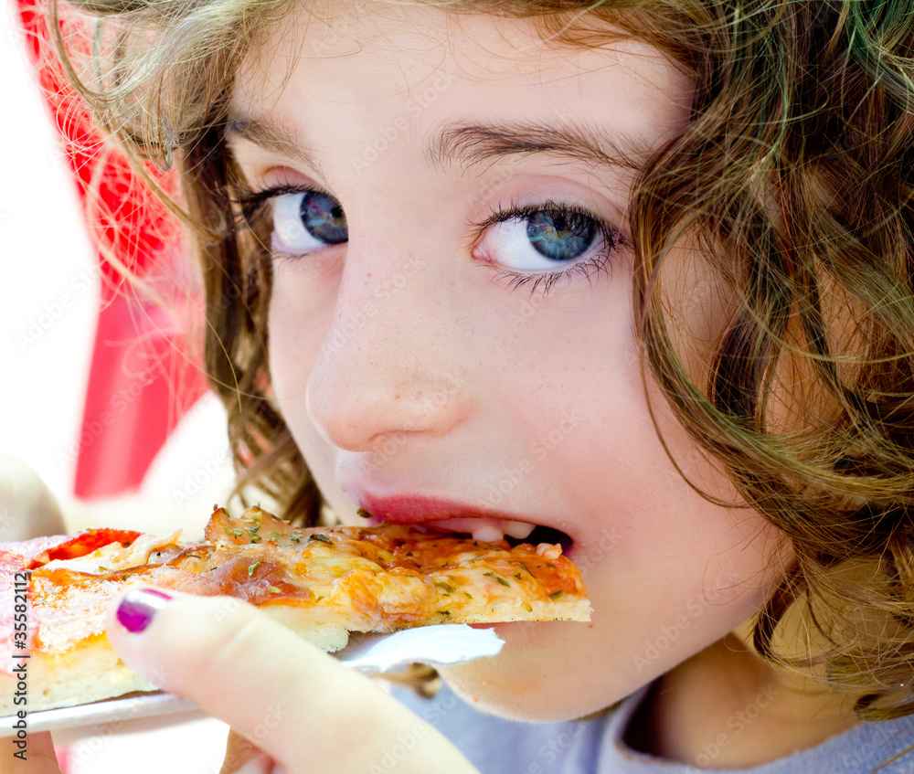 blue eyes child girl eating pizza slice