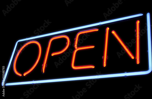 Open neon sign by night photo