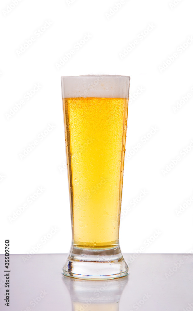 Glass of beer against white background Glass of beer against white background