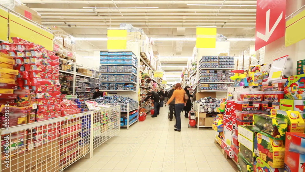 Stands with childrens goods in hypermarket